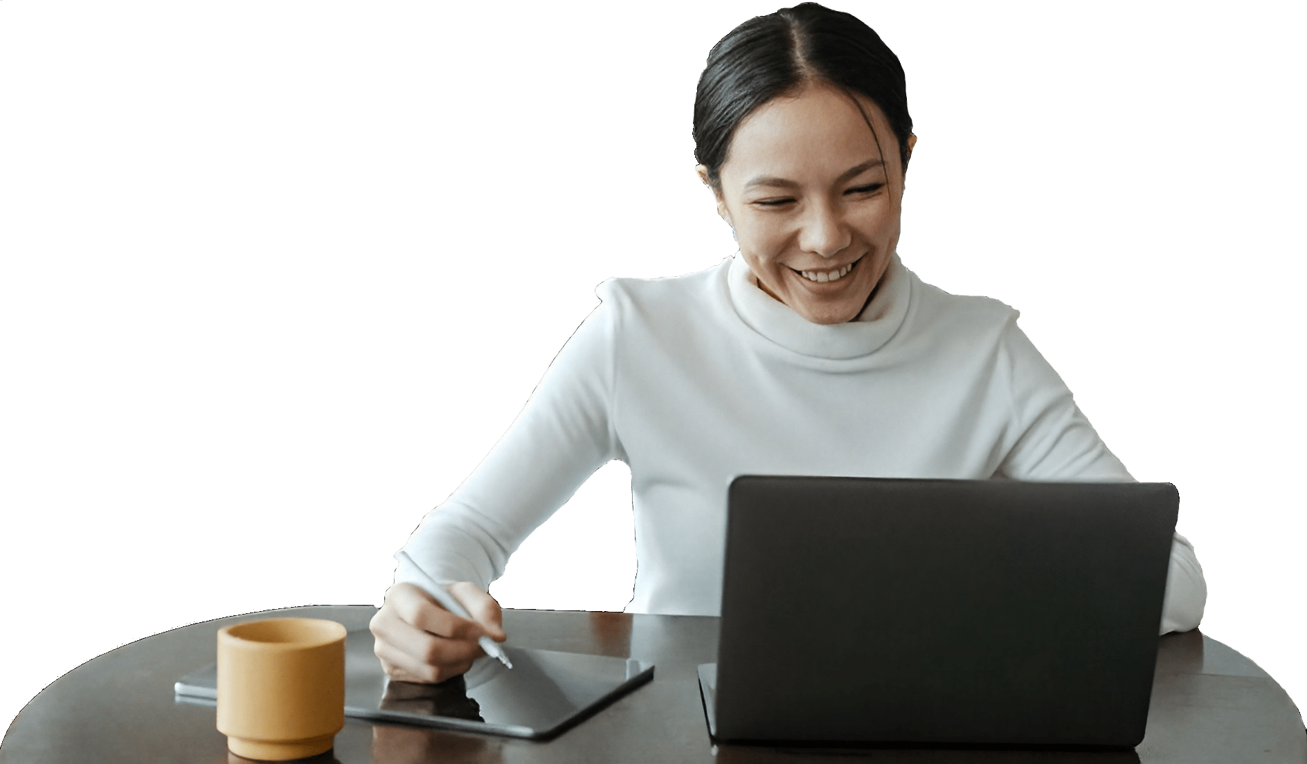 Woman drinking coffee at laptop using ABIM LKA study resources